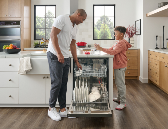 LG dishwasher and a dad and son